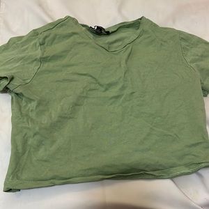 A light green crop top